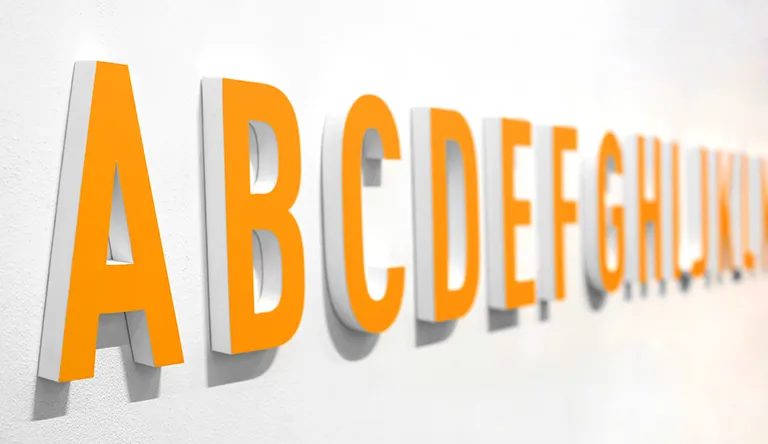 How to install dimensional signs content created with orange letters sign photo